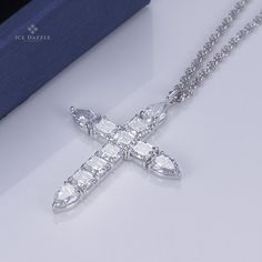 This luxurious Lab Grown Diamond Fancy Cut Cross Necklace in 14K White Gold will make a statement. Its impressive design and stunning craftsmanship combine to create a piece of jewelry that is truly one-of-a-kind. Luxury Diamond White Diamond Cross Necklace, White Gold Cross Necklace With Diamond Cut Cubic Zirconia, White Gold Cubic Zirconia Cross Necklace With Diamond Cut, White Diamond Cross Necklace For Weddings, White Gold Cross Necklace With Cubic Zirconia, White Cross Necklace With Brilliant Cut As Gift, Luxury Diamond White Cross Necklace As Gift, Gift White Brilliant Cut Cross Necklace, White Cubic Zirconia Cross Necklace For Anniversary