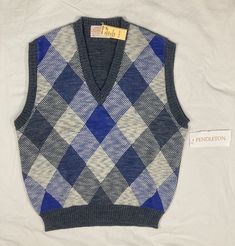 Vintage Womens Pendleton all wool sweater Vest. New with tags. Tag size: L - fit may vary - please see measurements - Includes original tags. New condition with no issues. *** Please refer to, compare and know your measurements before purchasing. *** Please see all pictures MEASUREMENTS LAID FLAT: Chest-underarm to underarm: 19.5” Length- middle of collar to bottom: 22” ~ I SHIP QUICKLY ~ -prompt payment is appreciated- -Please ask any questions before bidding- PAYMENT: -Unpaid item cases will b Retro Witch, Argyle Print, Pendleton Wool, Flat Chest, Wool Sweater, Sweater Vest, Wool Sweaters, Vest Jacket, Vintage Ladies