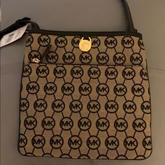 Never Used. Brand New Michael Kors Crossbody Travel Bag, Michael Kors Travel Pouch Bag, Michael Kors Tan Bag With Gold-tone Hardware, Michael Kors Tan Bag With Adjustable Strap, Michael Kors Tan Travel Bag, Michael Kors Tan Crossbody Bag, Chicago Bulls Dress, Beautiful Evening Gowns, Colorful Blouses