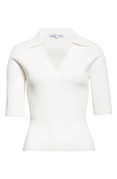 Narrow ribs trace your curves in a sporty polo that's updated with elongated short sleeves and a johnny collar. 23" length (size Medium) Johnny collar V-neck Elbow-length sleeves 63% viscose, 21% nylon, 14% polyester, 2% elastane Dry clean Imported Fitted V-neck Polo Shirt For Workwear, White Elegant Collared Polo Sweater, Elegant White Polo Collar Sweater, Elegant White Polo Sweater, Classic Fitted V-neck Polo Sweater, White Ribbed Polo Collar Top, White Ribbed Top With Polo Collar, Fitted Chic Polo Sweater With Seamless Collar, Elegant White Polo Shirt With Ribbed Collar