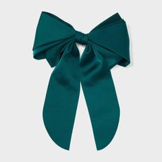 Bring a touch of unexpected movement to your hairstyle with this Long Tail Bow Hair Barrette from A New Day™. This fashion hair accessory features a dark teal green bow with cascading, long tails, adding a touch of flair to your outfit. Plus, the barrette base provides a secure grip, making it easy to manage and style all hair types. A New Day™: Style that goes wherever you do. Suede Headbands, Dark Green Hair, Dark Teal Green, Green Bows, Your Hairstyle, Fashion Hair Accessories, Fashion Hair, Bow Hair, Bow Design