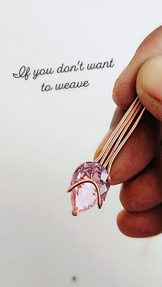 a person is holding a pink stone in their left hand and the words if you don't want to wear it