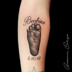 a black and white photo of a foot with the words beautice on it