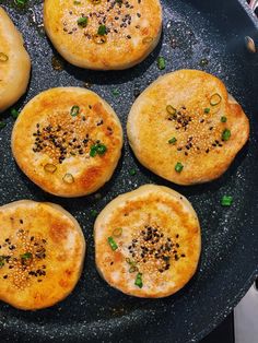 some food is cooking in a pan on the stove top and ready to be cooked