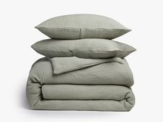 three pillows stacked on top of each other