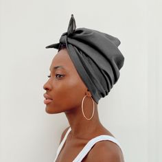 The Top knot Pre-Tied Turban is made fabric that is stretchy, light, and comfortable with a soft neutral undertone that compliments all skin tones. This turban is designed to be worn ‘as is’! The back of the turban is secured with gathered pleated fabric details adding flattering volume and providing comfort and stability. Each turban was designed with comfort, style, and wearability in mind. Ready to Wear Turban Cap. The turbans are designed to be worn easily- there's absolutely no tying or clo Afro Hair Wrap, Brand Photo Shoot Ideas, Turban Fashion, Headwrap Hairstyles, Neutral Undertone, Hair Care Natural, African Turban, Turban Cap, Head Wraps For Women