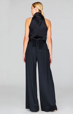 An elegant tie neck blouse cut in luxurious silk satin. The full ties can be worn loose down the back or draped around the neck and the elegant halter neckline is perfect worn alone or under a jacket. Satin Pajama Pants, Tie Neck Tops, Pajama Pant, Evening Jackets, Tie Neck Blouse, Satin Pajamas, Halter Neckline, Slim Pants, Silk Crepe