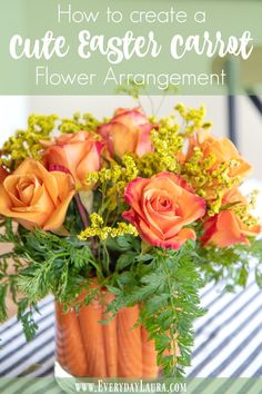 an orange vase filled with flowers on top of a table