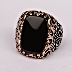 Men's onyx gemstone signet ring which will give you a head turning presence. This mystic, vintage style, engraved ring has a unique design for the polished, refined, and distinguished man. Perfect for casual and formal events, it will make your friends envious as you walk into the room full of confidence and pride. Looking for a unique, one of a kind GIFT FOR HIM, groomsman gift, father's day gift, teacher day gift? Look no further. This cool gemstone ring is the right answer and best gift for a Antique Black Signet Ring For Gift, Black Engraved Rectangular Jewelry, Black Rectangular Engraved Jewelry, Black Engraved Ring For Anniversary, Vintage Black Onyx Signet Ring, Black Antique Engraved Ring With Polished Finish, Vintage Black Signet Ring With Gemstone, Antique Black Engraved Ring As Gift, Antique Black Engraved Ring With Polished Finish