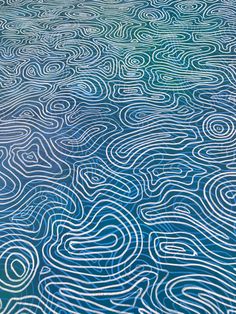 an abstract blue and white painting with wavy lines in the water, as seen from above