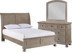 a bed, dresser and mirror are shown in this image with white sheets on it