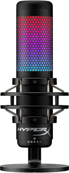 an image of a colorful speaker on top of a black stand with two microphones attached to it