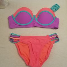 Brand New, Never Worn, 2-Piece Bikini, Beautiful Color Combination, Removable Straps - Wear Strapless , Push Up Padded Cups, Underwire, Double Clasp Back Closure, Sexy Colorful String Detailing On Bottoms, Top Is Size L, Bottom Is Size M, Nwt Purple Underwire Swimwear, Bra Friendly, Pink Bra-friendly Beachwear Swimwear, Pink Triangle Top Swimwear With Built-in Bra, Pink Micro-elastic Swimwear, Multicolor Stretch V-neck Swimwear, Beautiful Color Combinations, Push Up, Color Combinations, Womens Swim