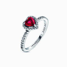 Tell the world you believe in love with our Elevated Red Heart Ring. A heart-shaped red man-made crystal sits at the centre of the ring accented by sparkling pav� in the frame of the setting and along the front of the band. Pair it with other Pandora Timeless pieces, like our Red Heart Stud Earrings, for an elegant look. Red Heart Ring, Ruby Heart Ring, Pandora Red, Charms Pandora, Pandora Rings, Charm Rings, Heart Decorations, Engagement Jewelry, Heart Earrings Studs