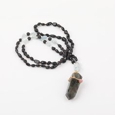 MANIFEST NEW OUTCOMES  💗 Transformation  💗     💗 Intuition  💗   Who said jewelry has to be minimal?  This labradorite point necklace combines a crystal point shape with gemstone beads to create a unique piece  of labradorite jewelry.   MS-LABRADORITE   Due to its unique appearance, Labradorite stone is often cut into cabochons, beads, and other jewelry components .  Wear this labradorite pendant to enhance spirituality and manifest new outcomes.   Product Information: Main Pendant Stone:  Natural Labradorite  Beads:  Black Tourmaline, Aquamarine  Length:  32"  Weight:  0.18 lbs   Color shades can vary on all-natural stones. Please allow for slight variations.   Remember that all-natural gemstones reveal true beauty under direct sunlight.    Please Note : It's essential to cleanse and e Spiritual Moonstone Crystal Necklace With Gemstone Beads, Labradorite Gemstone Beads Necklace For Meditation, Labradorite Crystal Necklaces With Natural Stones For Healing, Labradorite Crystal Necklace With Natural Stones For Healing, Spiritual Labradorite Jewelry With Gemstone Beads, Spiritual Moonstone Beaded Necklace With Natural Stones, Spiritual Labradorite Crystal Necklaces For Meditation, Spiritual Labradorite Gemstone Necklace, Healing Labradorite Crystal Necklace