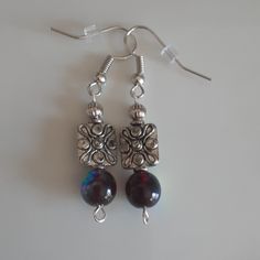 Beautiful Handcrafted Boho Style Earrings , Silver Tone With Silver Beads And Iridescent Beads That Appear Black / Purple Depending How The Light Hits Them . Iridescent Beaded Jewelry As A Gift, Iridescent Beaded Jewelry For Gift, Handmade Iridescent Jewelry With Round Beads, Handmade Iridescent Round Bead Jewelry, Silver Czech Glass Jewelry With Matching Earrings, Handmade Iridescent Round Bead Earrings, Handmade Iridescent Earrings With Round Beads, Silver Beaded Metal Earrings As Gift, Silver Metal Beaded Earrings For Gift