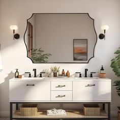 a bathroom with a large mirror above the sink and two baskets on the floor below it