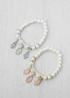 beautiful pearl bead bracelet with hamsa hand charms stretchy wristband for a comfortable fit comes in both gold or silver Pearl Bead Bracelet, Hand Bracelet, 3d Nail, Rings Bracelets, Accent Nails, Earrings Rings, Nail Glue, Hamsa Hand, 3d Nails