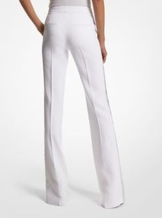 This season’s iteration of our classic Haylee trousers embodies the glamorous aesthetic of Fall/Winter 2023. An embellished stripe runs along the sides of this tuxedo pant for a simple yet striking effect, while the flattering flared leg styles easily with pointed-toe heels. Wear it with the matching blazer. Elegant Straight Leg Wedding Bottoms, Chic Embellished Bottoms For Wedding, Chic Embellished Wedding Bottoms, Luxury White Pants For Wedding, Luxury White Wedding Bottoms, Luxury White Bottoms For Evening Wear, Elegant Fitted Pants For Gala, Luxury White Bottoms For Evening, Luxury White Evening Pants