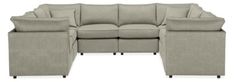 a white couch with two recliners and one end facing the same direction, in front of a white background