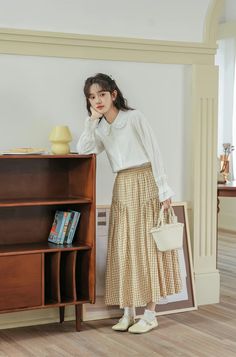 Linen blend gingham skirt with an elasticised waist, scalloped hip pattern and twirly midi hem. Lined. One Size: 24"-36" waist, 30" length Gingham Skirt, Overall Dress, Sweater Blouse, Cardigan Jacket, Jeans Pants, Linen Blend, Gingham, Sweaters & Cardigans, Midi Skirt