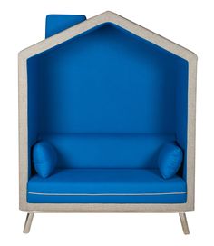 a blue chair with two pillows on the seat and one pillow in the back, against a white background