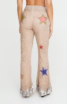 Step out in bold, glamorous style in these elaborately beaded flare-leg pants adorned with sparkly sequins and vibrant stars. Exclusive retailer Hidden side-zip closure 100% polyester Dry clean Imported Sequin Flare Pants For Party Season, Bling Flare Pants, Flare Pants With Sequins For Party Season, Sequin Flare Pants Nordstrom, Festive Wide Leg Embellished Pants, Beaded Flare Pants, Silver Tassel Sequin Flared Pants, Silver Trousers, Mesh Pants