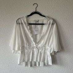 Lace White Blouse. Never Worn. Buttons In Front Feminine Chiffon Blouse For Brunch, Feminine Chiffon Tops For Brunch, Flowy Chiffon V-neck Blouse, Feminine Flowy Chiffon Tops, Flowy Feminine Chiffon Tops, Chiffon V-neck Top For Night Out, Sheer Flowy Chiffon Top, Feminine Chiffon Tops For Vacation, Feminine Chiffon V-neck Top