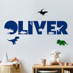 a child's room with dinosaur decals and toys