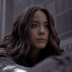 an image of a woman with long hair in the avengers age of ulhance