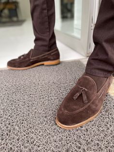 Discover the perfect blend of style and comfort with Remy Brown Suede Tassel Loafers for Men. Crafted from premium suede leather, these loafers feature a luxurious calf skin lining for superior comfort, making them ideal for both formal occasions and smart-casual outings. Whether you're heading to a business meeting or a wedding, these versatile shoes elevate any outfit with elegance. - Sole: Rubber - Inner Lining: Calf Skin - Material: Suede Leather - Available Sizes: 39-45 Closed Toe Slip-on Tassel Loafers For Galas, Slip-on Tassel Loafers For Galas With Closed Toe, Galas Slip-on Tassel Loafers With Rubber Sole, Brown Slip-on Tassel Loafers For Galas, Brown Tassel Loafers For Galas, Casual Tassel Loafers With Plain Toe For Galas, Casual Plain Toe Tassel Loafers For Galas, Slip-on Tassel Loafers For Galas, Suede Tassel Loafers With Round Toe