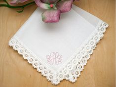 Beautiful monogram wedding handkerchief for the Bride, Mother of the Bride, Bridesmaids....any one in the wedding party!  Whether catching tears of joy or becoming a cherished heirloom, your custom embroidered wedding handkerchief will hold memories for years to come. WEDDING HANDKERCHIEFS hold a special place in the hearts of brides, especially in Southern traditions. These delicate keepsakes are both practical and sentimental, making them perfect for bridal showers or the wedding day itself. Let's explore the details of this cherished tradition: PERSONALIZATION: As you add the item to your cart, you can choose: - The type of handkerchief (e.g., White Daisy Tip Lace or Petal Cluny Lace). - The thread color for the initials (ANY color!) - The monogram design (e.g., dot monogram or fishtail Elegant Personalized Handkerchiefs For Bridal Shower, Elegant White Handkerchiefs For Bridal Shower, Personalized Elegant Handkerchiefs For Bridal Shower, Elegant Handkerchiefs With Initials For Wedding Gift, Elegant Machine Embroidered Handkerchiefs For Gifts, Elegant Embroidered Handkerchiefs For Bridal Shower, Elegant Monogrammed Handkerchiefs For Weddings, Elegant Initials Handkerchiefs For Wedding Gift, Embroidered White Handkerchiefs For Bridesmaids