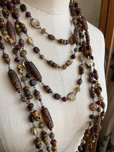 Beautiful saturated palette ranging from deep russet to bone, and including horn, wood, bone, bronze and brass, plus select Czech glass from two different importers. Focal beads include red horn and 9-eye dzi beads in beautiful hues. Sold by the foot, and limited to stock on hand. Bohemian Eclectic, Bone Necklace, Bone Jewelry, Jewelry Making Necklace, Focal Beads, Ethnic Jewelry, Jewelry Inspo, Focal Bead, Clothing Ideas