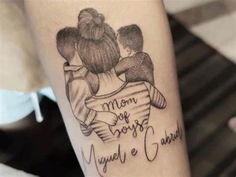 a woman with a tattoo on her arm that says mom, be happy and you'll