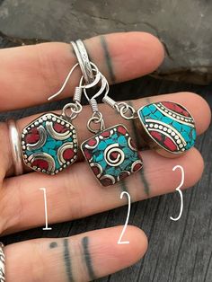 Beautiful boho style short dangle earrings, made with white metal and unique details with brass and small pieces of Turquoise and Coral. In the pictures you will see a number that represents each style for you to choose from. Easy and fun earrings that you will be able to wear with your everyday outfits. Style #1- Made in a Hexagon shape, the earrings are 1.8cm- 0.75 inch long by 1.8cm, 0.75 inch wide. They have a drop length of 3cm- 1.25 Style #2- Made in a Teardrop shape, this earrings are 1.8 Bohemian Dangle Cartilage Earrings Gift, Bohemian Dangle Cartilage Earrings For Gifts, Bohemian Nickel-free Cartilage Earrings As Gift, Nickel-free Bohemian Cartilage Earrings As Gift, Nickel-free Drop Cartilage Earrings For Festivals, Bohemian Wire Wrapped Cartilage Earrings Gift, Bohemian Drop Cartilage Earrings As Gift, Nickel Free Bohemian Dangle Cartilage Earrings, Nickel-free Bohemian Pendant Earrings