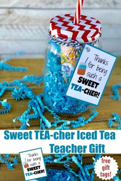 a jar filled with blue shredded paper next to a teacher's gift tag that says, sweet tea - cheer iced tea teacher gift