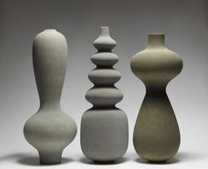 three vases are shown in different shapes and sizes