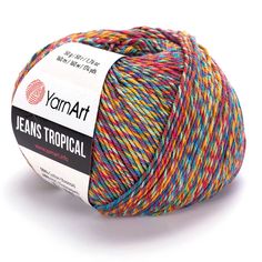 a ball of yarn that is multicolored and has the words jean's tropical on