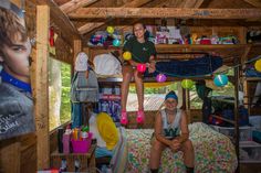 two women sitting on bunk beds in a room