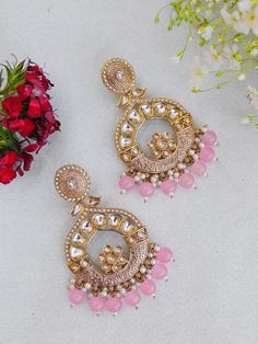 Unleash your inner diva with our mesmerizing Indian Kundan Earrings. Designed to make a bold statement, these earrings exude captivating splendor, blending traditional Indian aesthetics with contemporary allure. Crafted with meticulous attention to detail, these earrings showcase the artistry of Kundan work. The vibrant Kundan stones take center stage, radiating a luminous charm that catches every eye. The intricate setting in gleaming golden tones adds an element of opulence and elevates their Punjabi Jewelry, Kundan Work, Jewelry Pakistani, Chandbali Earrings, Kundan Earrings, Pakistani Wedding, Jewelry Earrings Dangle, Diva, Dangle Drop Earrings