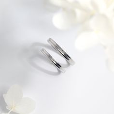 Material: High-Quality Solid 925 Sterling Silver (Nickel-Free and Lead-Free)Color: SilverWidth: 2.2mm and 2.7mm 2.2mm Ring Size: Adjustable, Suitable for Sizes from 3 to 102.7mm Ring Size: Adjustable, Suitable for Sizes from 5 to 14Packaging: Complimentary Gift Box and Jewelry Pouch Care Instructions: Sterling silver can be worn in the shower and will not rust. Silver will oxidize naturally, use a gentle silver cleanser or a silver polishing cloth to clean and re-shine as needed. Store your jewe White Gold Sterling Silver Couple Rings With Round Band, White Gold Sterling Silver Couple Rings, Hypoallergenic White Gold Open Band Ring, Hypoallergenic White Gold Promise Ring, Classic Hypoallergenic White Gold Midi Rings, Minimalist Stackable Sterling Silver Couple Rings, Hypoallergenic White Gold Stackable Promise Rings, Hypoallergenic Stackable Open Band Rings For Anniversary, Modern Hypoallergenic Stackable Rings For Anniversary