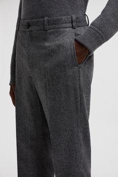 Boasting a soft yet resistant finish, these pants are crafted from a wool and nylon blend. The slacks feature a herringbone pattern in a nod to sartorial elegance. Creating a sophisticated cold weather look, they layer perfectly with a matching puffer. Elegant Wool Bottoms For Winter, Business Casual Bottoms For Winter With Straight Hem, Wool Bottoms For Winter Workwear, Elegant Wool Pants For Winter, Classic Winter Pants With Welt Pockets, Classic Wool Dress Pants For Winter, Classic High-waisted Winter Pants, Classic High-waisted Pants For Winter, Elegant Winter Bottoms With Straight Hem