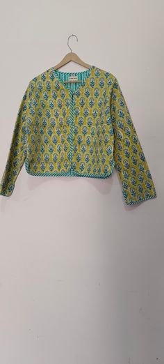 Indian Handmade Jackets, Coats, Boho ,Quilted, For Women`s Made In India XL Size - Chest -43 inch Length - 25 Inch Shoulder-16 inch Sleeves - 23 inch Color - yellow  Flower Fabric Quality - 92x80 Cambric . 100 % Hand Block Handmade... For the very reason that each item has been handmade there is always an element of human error, whether it be a missed stitch or overlapping block print design. Yet for us the beauty is in the imperfection. These are the signs that mean your cushion or quilt hasn't Green Cotton Long Sleeve Cardigan, Patterned Long Sleeve Cotton Outerwear, Multicolor Cotton Outerwear With Floral Print, Casual Green Printed Outerwear, Multicolor Block Print Long-sleeve Blouse, Patterned Long Sleeve Outerwear For Spring, Floral Print Cotton Long Sleeve Outerwear, Patterned Long Sleeve Spring Outerwear, Long Sleeve Cotton Cardigan With Floral Print