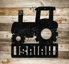 a tractor with the word diesel on it is mounted to a wooden planked wall