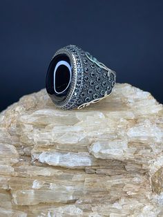 Onyx Silver Men's Ring | Handmade | 15g | Free Shipping 🔹 Discover the allure of our handcrafted Onyx Stone ring, designed for those who appreciate elegance and sophistication. This remarkable men's ring, weighing a solid 15 grams, features a dazzling Onyx gemstone that captures and reflects light in a mesmerizing array of colors. 🔹 Key Features: *Material: Premium Silver *Gemstone: Onyx *Weight: 15 grams *Design: Handcrafted for unique beauty *Guarantee: 1 year 🔹 Why You'll Love It: *Captiva Unique Black Round Signet Ring, Unique Black Signet Ring For Anniversary, Luxury Handmade Black Rings, Sterling Silver Stone Rings, Stone Ring Design, Black Onyx Stone, Onyx Gemstone, Mens Silver Rings, Sterling Silver Mens