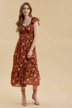 Burgundy floral midi dress with ruffle sleeve, sweetheart neckline, lace up back detail, and ruffled hem 100% polyester. Lined. Casual Midi Dress With Ruffled Fitted Bodice, Flowy Smocked Dress With Ruffles And Empire Waist, Bohemian Dress With Smocked Bodice And Ruffled Straps, Casual Midi Dress With Sweetheart Neckline And Ruched Detail, Fitted Midi Dress With Smocked Bodice And Ruffled Straps, Casual Ruffle Dress With Sweetheart Neckline, Fitted Brown Smocked Dress With Ruffles, Brown Square Neck Dresses With Ruffles, Brown Square Neck Dress With Smocked Back