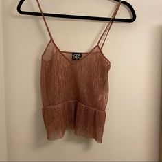 Worn A Couple Times, But Looks Brand New. Looks Great Tucked In Or Out With A Bralette! Fits Like A Small. Sparkly Peach With Slight Red And Gold Tones As Seen In The Pic Pink Casual Party Camisole, Peach Party Tops For Spring, Peach Party Top For Spring, Peach Sleeveless Top For Party, Peach Party Tops For Summer, Casual Pink Camisole For Night Out, Peach Tank Top, New Looks, Couple Time