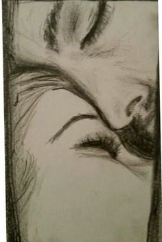 a pencil drawing of a woman's face with her eyes closed and long eyelashes