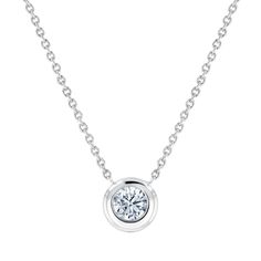 From the design studios of Roberto Coin, this diamond pendant necklace is expertly crafted from 18k white gold and a staple for any jewelry collection. The diamond is bezel set and stationed on and adjustable 16-18 inch 18k white gold cable chain. Diamond is 1/5ct, H or better in color, and SI1 in clarity. Roberto Coin signs each one of his pieces with a small ruby casted inside the jewel, in direct contact with the skin of who wears it. This magical signature, surrounded by an antique halo of l White Gold Necklaces With Brilliant Cut In Platinum, White Gold Platinum Necklace With Brilliant Cut, White Gold Platinum Diamond Cut Necklace, White Gold Platinum Necklace With Diamond Cut, White Gold Necklaces With Platinum Diamond Cut, White Gold Diamond Necklace With Round Platinum Pendant, White Gold Necklace With Lab Grown Diamond Round Cut, White Gold Necklace With Round Cut Lab Grown Diamond, Fine Jewelry Platinum Diamond Necklace With Round Pendant