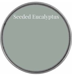 the words seeded eucalypus are in white letters on a light green background